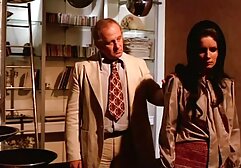 A girl who looks like actress Univer of the year 2000 stuck her fingers in hot sex v the ass, in the kitchen, standing cavalier in front of the lens